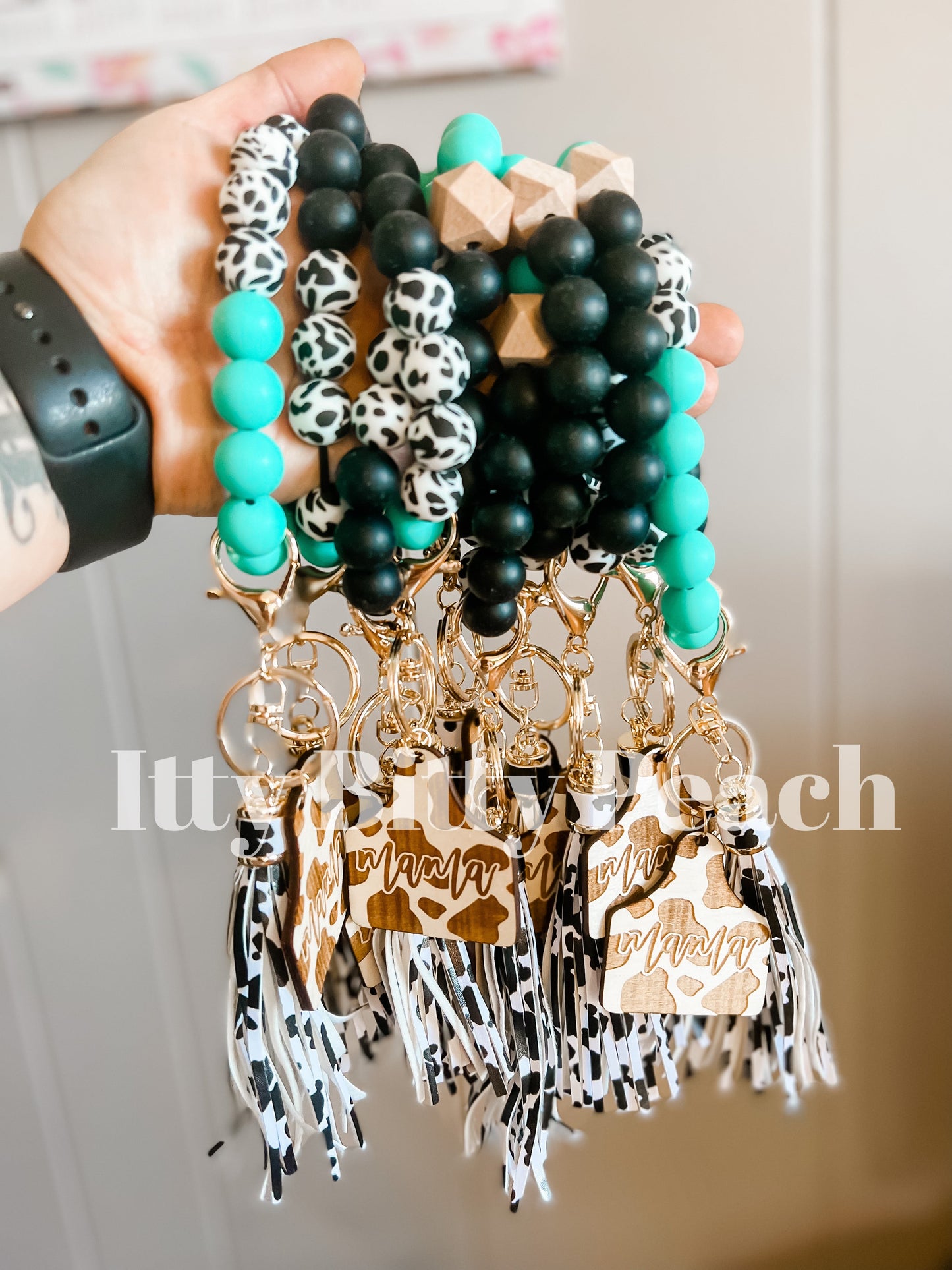 Teal mama cow tag wristlets