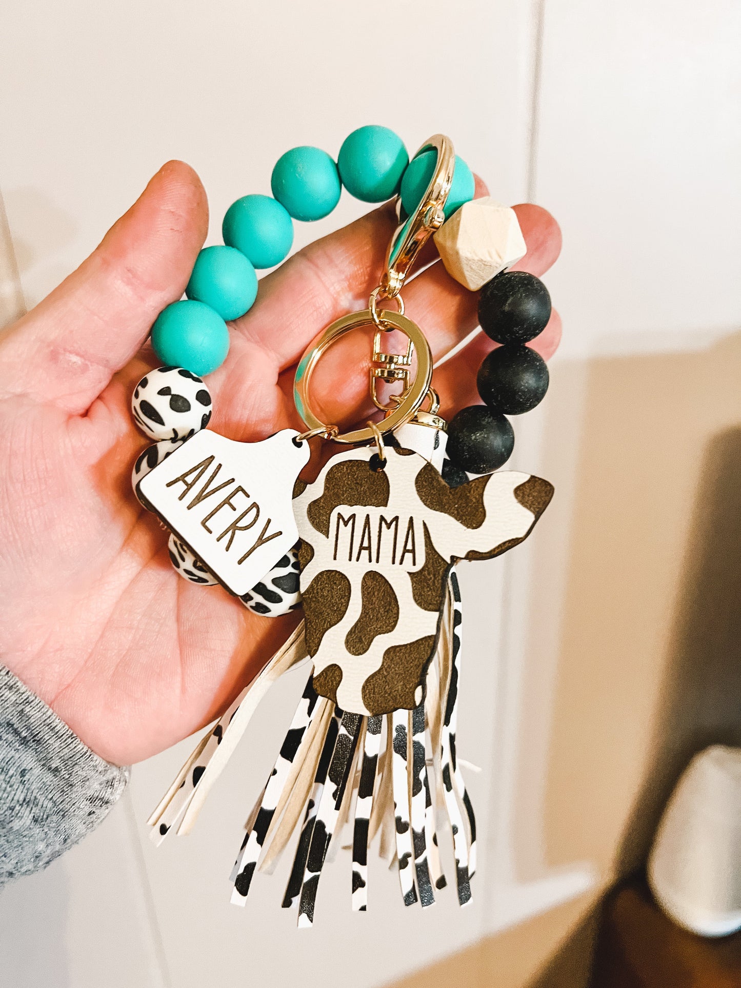 Mama cow wristlet teal with small tags