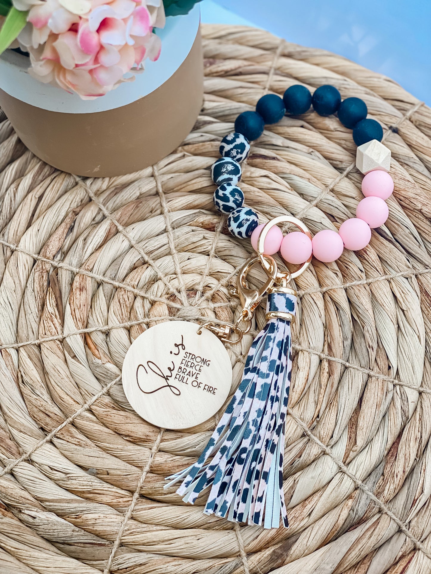 Blush cheetah she is wristlet