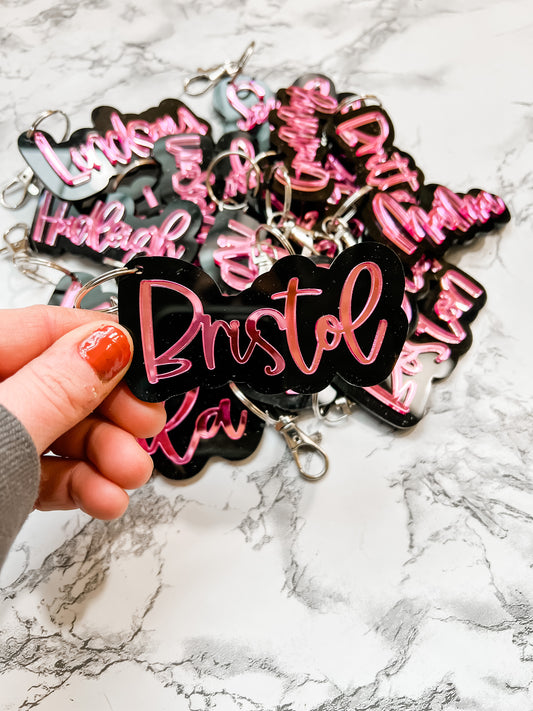 Black and pink acrylic name keychain